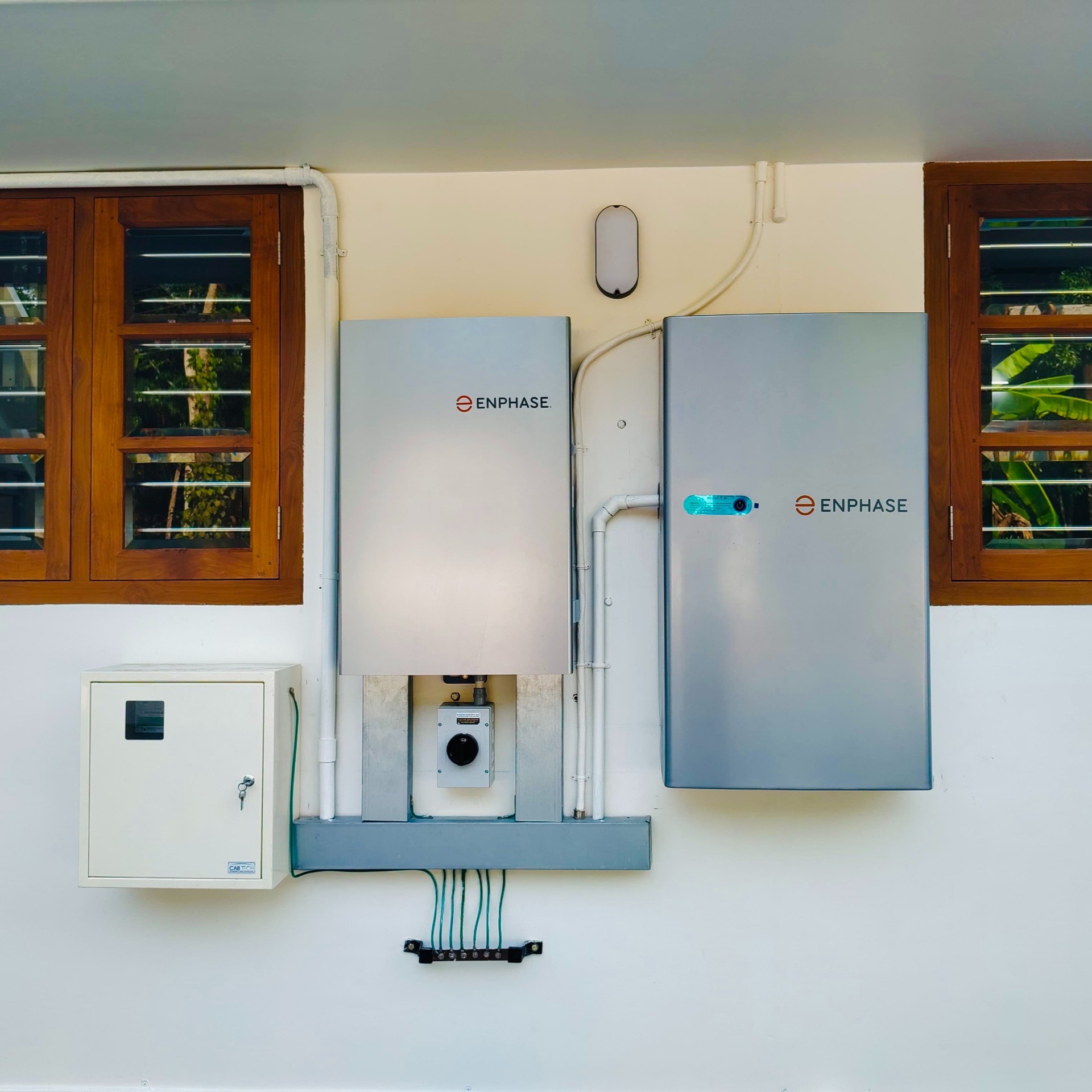 control panel instruments of Enhpase inserted on wall of a house